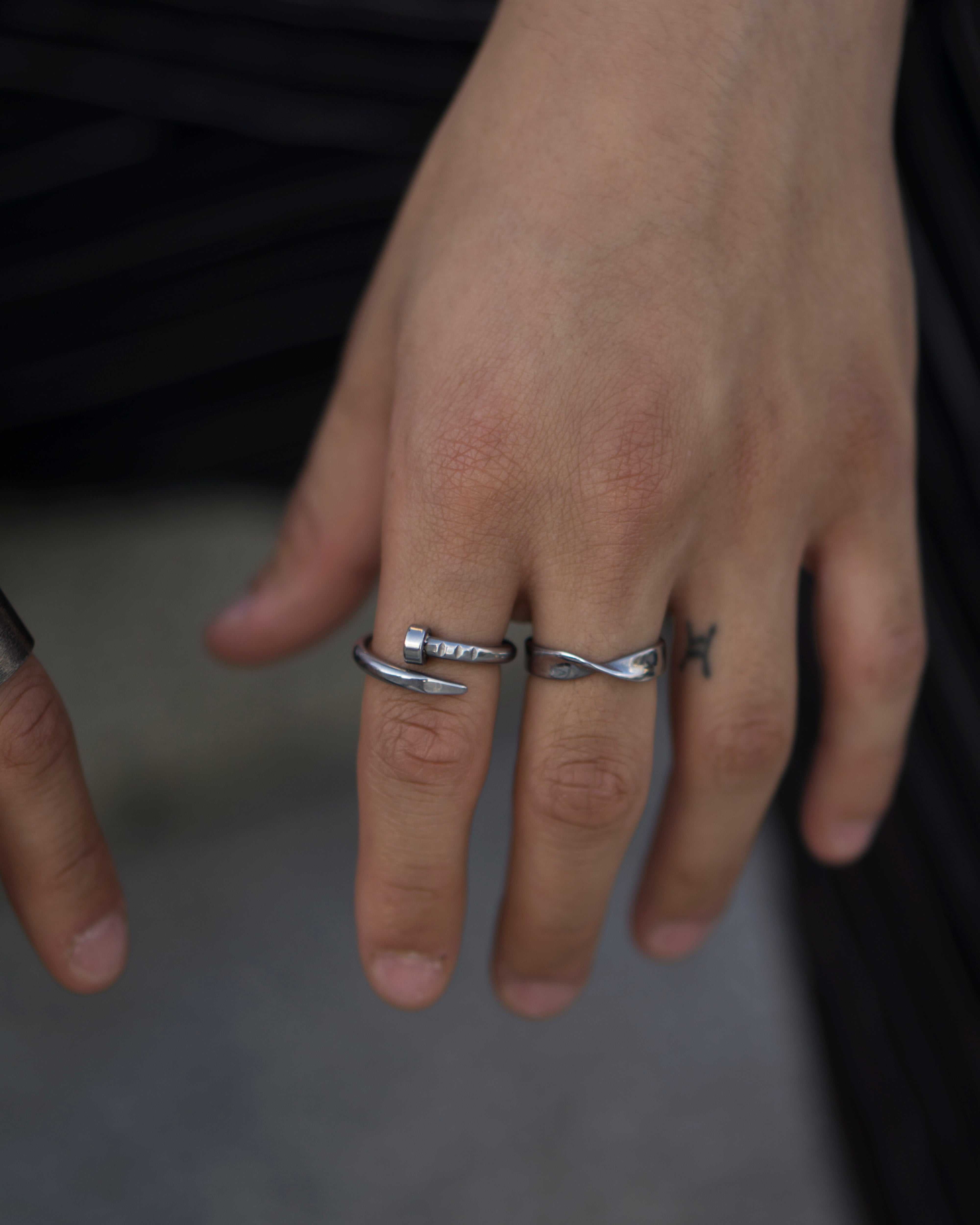 Endless Mobius chain.  Highlight your outfit with the statement piece. Elevate your style with our minimalist ring, perfect for daily wear and layering. Crafted from high-quality titanium and available in silver color.  Material: Titanium.  | water-resistant, no-tarnishing, hypoallergenic |