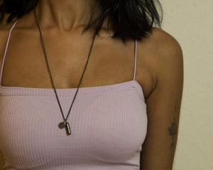 Serotonin regulates your mood, feelings of well-being, and happiness.  Minimalist necklace featuring delicately designed pill pendants. Elevate your style with our necklace, perfect for daily wear and layering. Crafted from high-quality stainless steel and available in dark silver color.  Material: Surgical steel, Color: Old silver. 60+5cm in length.  | water-resistant, no-tarnishing, hypoallergenic |